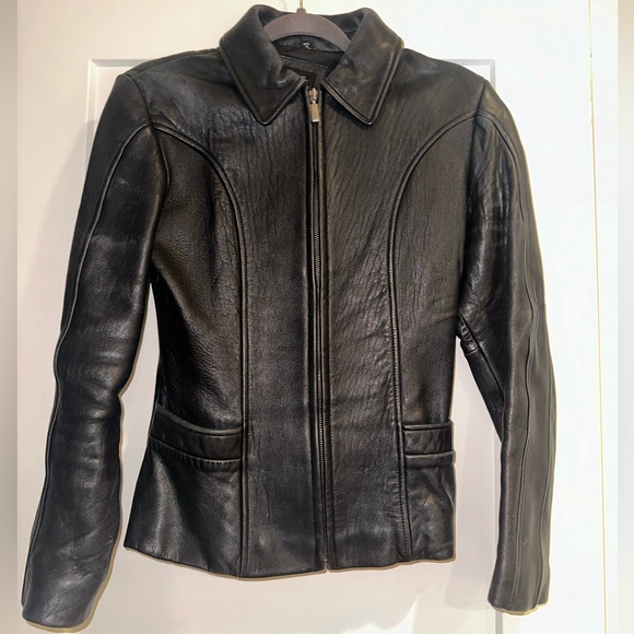 Guess black leather jacket. Thick, warm leather jacket with satin lining. - Picture 1 of 4